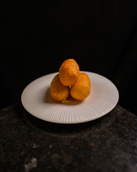 Gefüllte Kartoffelkroketten mit Pilzen, Bergkäse & Schnittlauchöl
